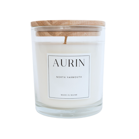 White Candle Smells Like North Yarmouth Maine. Soy wax, wood, leather, oak moss, amber. 